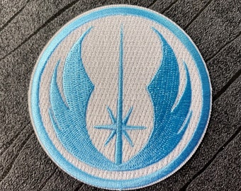 Jedi Order Embroidered Iron on Patch (75mm) in Pale Blue with White Background