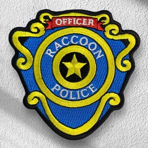 Raccoon City R.P.D. Embroidered Iron on Patch for Costume/Cosplay. Available in Sizes Small (80mm x 80mm) and Large (95mm x 95mm)