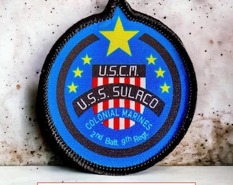 Naszywka do naszycia z wizerunkiem marines kolonialnych z USS Sulaco, Aliens. Mała, 70 mm x 60 mm