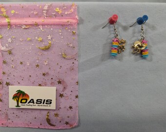 Pink, yellow and blue Lego stud earrings with unicorn charms