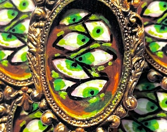 Green eyes that watch you - handcut vinyl sticker