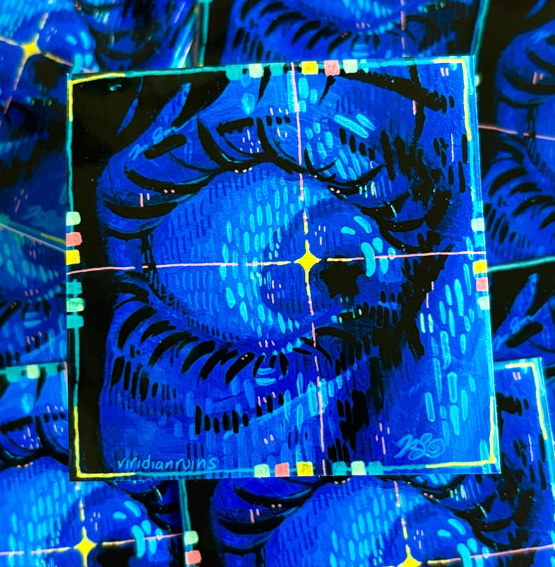 May include: Square sticker with a blue abstract illustration of a face. The artwork features a grid pattern with yellow starbursts and the text "viridianruins". The sticker has a black border with colorful accents.