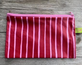 1 cosmetic bag/wallet, water-repellent, red with pink stripes