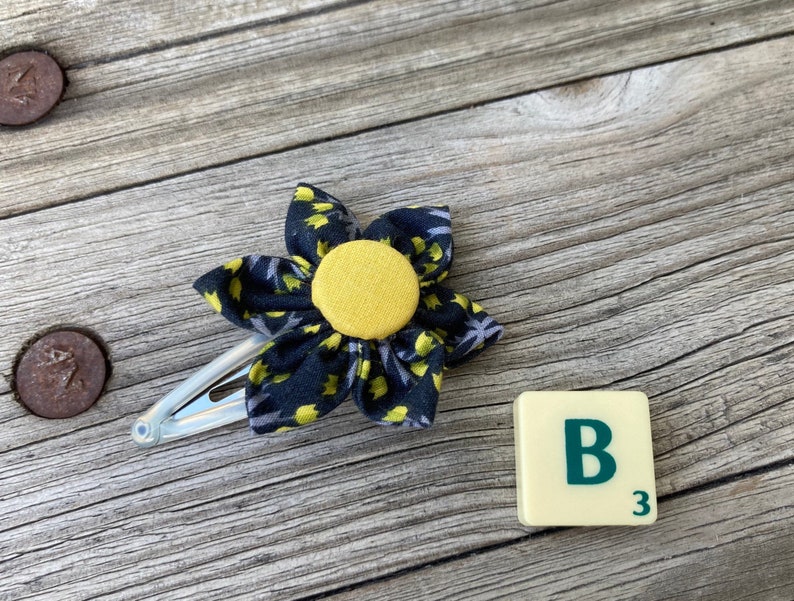 Fabric flower yellow black
