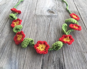 Crochet flower wreath to tie for flower children, red flowers