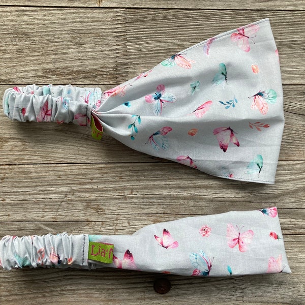 1 Haarband Kinder rosa Schmetterlinge auf  grau