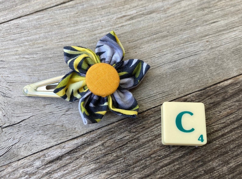 Fabric flower yellow black