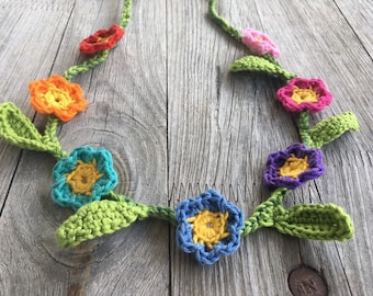 crocheted flower wreath to tie for flower children, colorful flowers