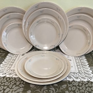 12 piece set of Corelle Wind Flower Dinnerware Dishes.