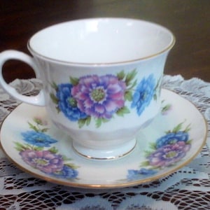 Vintage Queen Anne tea cup, fine bone china, blue, pink and green floral.