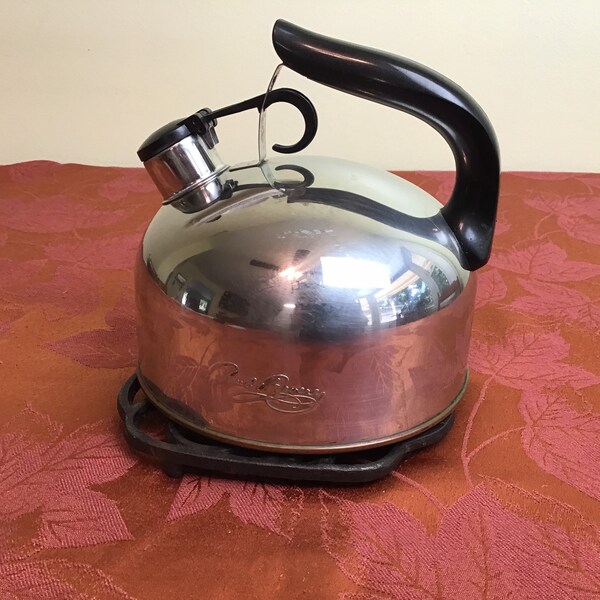 Vintage Paul Revere Ware stainless steel and copper whistling tea kettle.