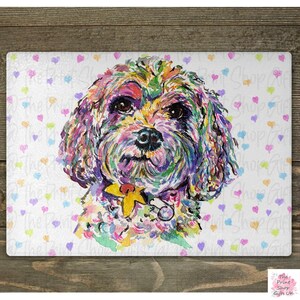 May include: A colorful watercolor painting of a small dog with a yellow flower on its collar. The dog is surrounded by a white background with a pattern of pink, blue, and green hearts.