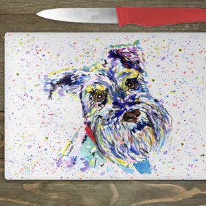 May include: A colourful watercolour painting of a small dog with a red collar on a white background with colourful paint splatters.