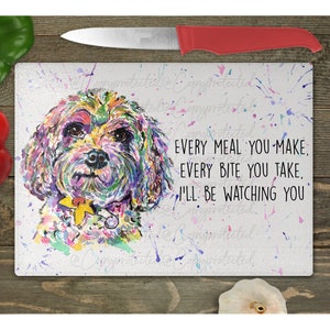 May include: A colorful watercolor painting of a small dog with the text "EVERY MEAL YOU MAKE, EVERY BITE YOU TAKE, I'LL BE WATCHING YOU" on a white background with colorful paint splatters.