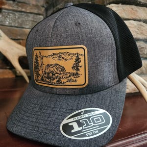 Grizzly Bear in Yellowstone National Park lasered into a Leatherette Hat Patch from an Original Drawing
