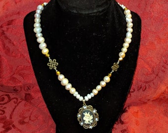 Natural Pearls with Flower Cameo