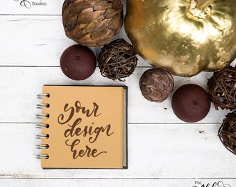 Kraft journal and golden pumpkin flatlay / Square instagram mockup / Autumn colors background for digital lettering