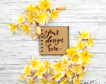 Kraftpaper journal flatlay with yellow plumeria flowers / Frangipani mockup / Tropical background for digital lettering / Instagram flatlay