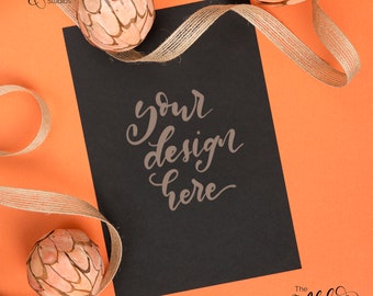 Orange and black flatlay / Halloween colors Instagram background / Black paper mockup