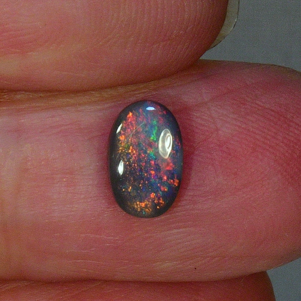 4.1 Carat Unset Red Black Opal Stone 6668