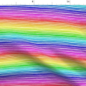 May include: A colourful rainbow striped fabric with a wavy pattern. The fabric is made up of alternating stripes of red, orange, yellow, green, blue, indigo, and violet.