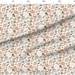 May include: A repeating pattern of various seashells, starfish, and coral in shades of beige, brown, and muted orange on a white background. The design features detailed illustrations of different shell types, creating a coastal or nautical theme.