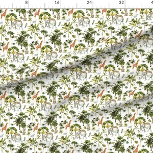 May include: White fabric with a repeating pattern of watercolor-style jungle animals and foliage. Giraffes, elephants, and monkeys are interspersed with palm trees and other greenery. The design has a whimsical, hand-painted aesthetic.