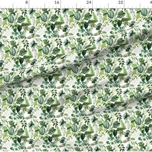 May include: A seamless pattern featuring a variety of green watercolor leaves and branches on a white background. The pattern is perfect for fabric, wallpaper, or other decorative projects.