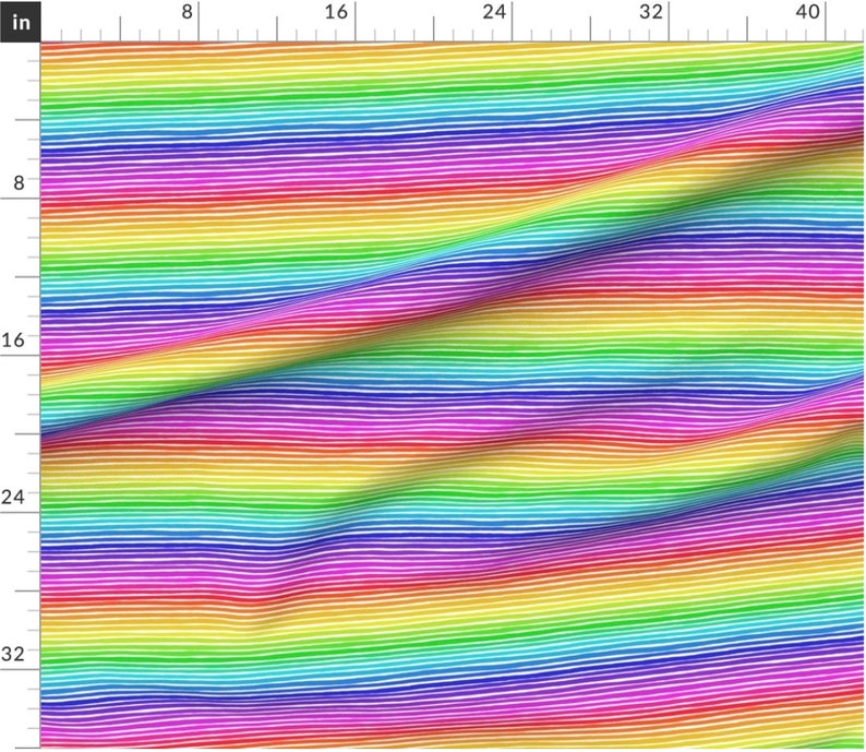 May include: A colourful rainbow striped fabric with a wavy pattern. The fabric is white with thin lines of red, orange, yellow, green, blue, indigo, and violet.