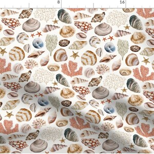 May include: A repeating pattern of seashells, starfish, and coral in shades of brown, beige, and rust on a white background. The design features various shell shapes and sizes, creating a coastal or nautical theme.