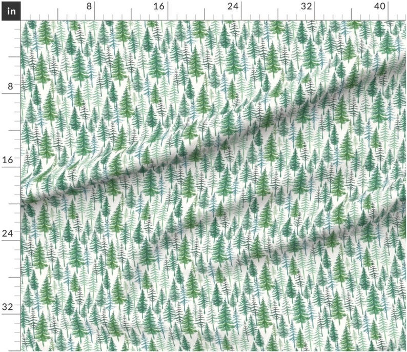 May include: A white fabric with a repeating pattern of green, blue, and black watercolor pine trees.