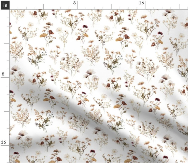May include: A seamless pattern featuring a white background with a repeating design of brown, beige, and white wildflowers. The flowers are arranged in clusters and are scattered throughout the pattern.
