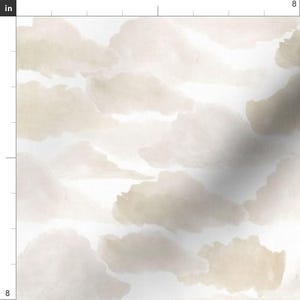 May include: Watercolor cloud pattern in shades of beige and white. The design features soft, overlapping cloud shapes, creating a dreamy and artistic aesthetic. The fabric measures 8 inches by 8 inches.