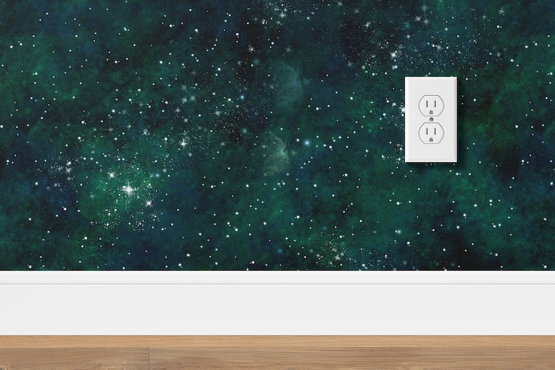 K&ouml;nnte beinhalten: Eine wei&szlig;e Steckdose vor einem dunkelgr&uuml;nen und blauen Hintergrund mit wei&szlig;en Sternen. Der Hintergrund &auml;hnelt einer Galaxie oder dem Weltraum.