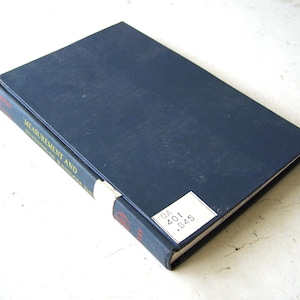 May include: A dark blue hardcover book titled Measurement and Analysis of Random Data. The spine features red text and a white label, while the front cover displays a white library call number label with the text QA 401 .B45 printed in black.