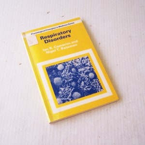 Pode incluir: Um livro amarelo intitulado "Respiratory Disorders" de Ian R. Cameron e Nigel T. Bateman. O livro faz parte da série Physiological Principles in Medicine.