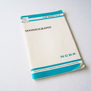 May include: A white book with a blue cover titled "MAMMOGRAPHY" and "NCRP REPORT No. 66". The book is published by the National Council on Radiation Protection and Measurements.