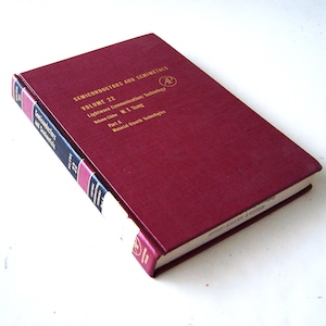 May include: A burgundy hardcover book titled "Semiconductors and Semimetals, Volume 22, Lightwave Communications Technology, Part A, Material Growth Technologies" with gold lettering and a gold "AP" logo on the cover.