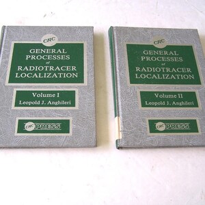 May include: Two gray hardcover books with green titles and spines. The books are titled "General Processes of Radiotracer Localization" and are volumes I and II. The books are published by CRC Press.