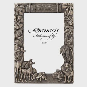 May include: A silver-toned picture frame with jungle-themed relief carvings. The frame features a giraffe, lion, and other animals, along with the text "Little Explorer Big Adventures" and "Genesis a little piece of life..." The frame is sized for a 15x10 cm photo.