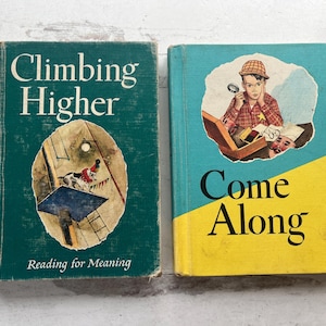 May include: Two vintage children's books. One is teal with the title "Climbing Higher" and an illustration of a dog. The other is blue and yellow with the title "Come Along" and an illustration of a boy with a magnifying glass.