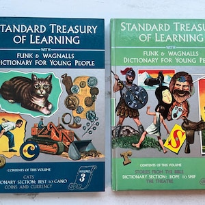 May include: Two vintage hardcover books titled "Standard Treasury of Learning" with "Funk & Wagnalls Dictionary for Young People." Volume 3 features a cat illustration, while Volume 16 has a warrior and other illustrations. The books are in good condition.