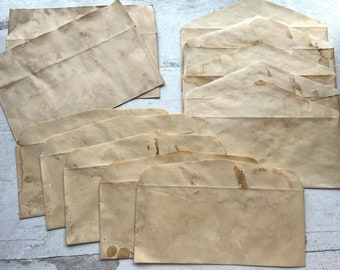 Variety pack of 12 coffee dyed and stained 9.5 inch white paper envelopes 3 different styles of flaps grubby grungy junk journal ephemera