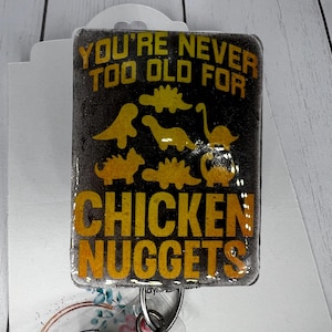 Never Old for Dinosaur Dino Chicken nugget Food Badge | Nuggie Badge | Retractable ID Holder | Glitter Badge Fun Reel | Nurse Badge Clip