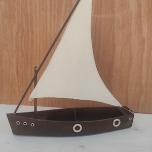 handmade wooden dinky boat bottle holder