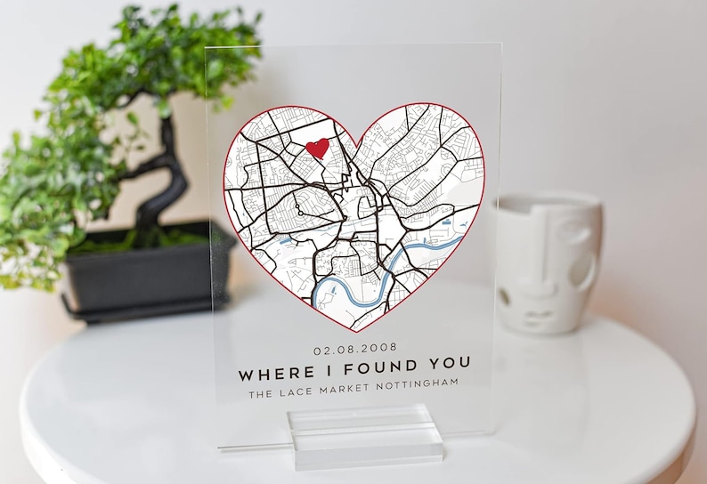 May include: A clear acrylic sign with a red heart-shaped map of Nottingham, England. The map includes a red dot marking the location of The Lace Market. The text "02.08.2008 WHERE I FOUND YOU THE LACE MARKET NOTTINGHAM" is printed below the map.