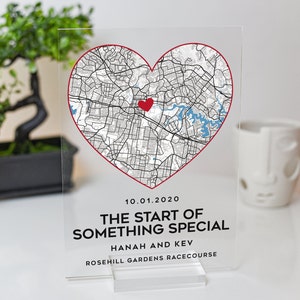 May include: A clear acrylic plaque with a red heart-shaped map of Rosehill Gardens Racecourse, Sydney, Australia. The date 10.01.2020 is printed below the map, along with the text "The start of something special, Hannah and Kev".