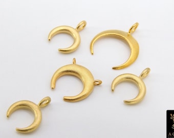 May include: Five gold crescent moon charms with a brushed finish. The charms have a loop at the top for attaching to jewelry.