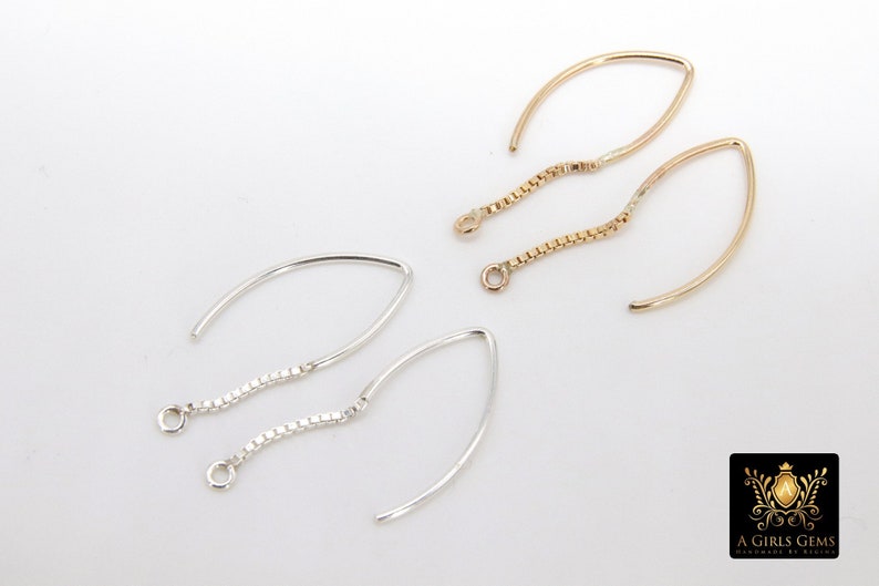 Pu&ograve; includere: Due paia di ganci per orecchini con catene delicate. Un paio &egrave; d'oro e l'altro d'argento.