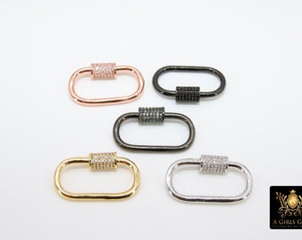 Könnte beinhalten: Fünf verschiedene farbige Metall-Hummerverschlüsse mit klaren Zirkonia-Steinen. Die Verschlüsse sind in Roségold, Schwarz, Silber und Gold.